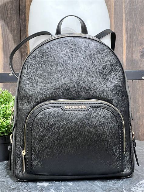 michael kors large leather backpack.